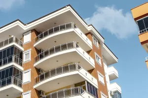 Modern Apartment Buildings Prints: Balconies and blue sky with clouds