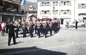 Central European Historic Quarters Prints: Bandsmen playing marching in square