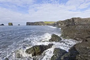 Rocky Coastline Photos Prints: Basalt cliffs and a rock arch on the coast