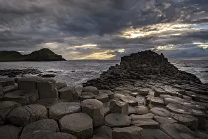 Atlantic Ocean Rock Formations Prints: Basalt columns by the coast at sunset