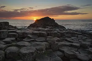 UNESCO World Heritage Sites UK Prints: Basalt columns by the coast at sunset