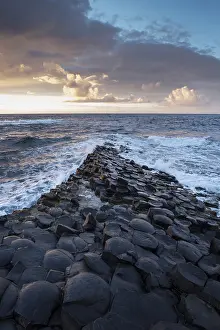 Northern Ireland Photography Prints: Basalt columns by the coast at sunset