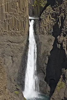 Atlantic Ocean Waterfalls Prints: Basalt columns lining Litlanesfoss Waterfall