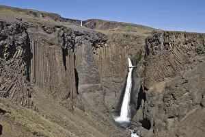 Natural Stone Pillars Prints: Basalt columns lining Litlanesfoss Waterfall