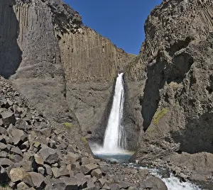 Atlantic Ocean Waterfalls Prints: Basalt columns lining Litlanesfoss Waterfall