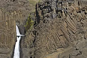 European Natural Wonders Prints: Basalt columns lining Litlanesfoss Waterfall