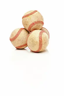 Baseball Equipment Prints: Four Baseballs Isolated on a Reflective White Background