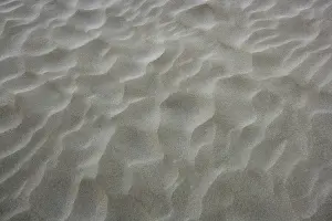 Empty Beachfront Scene Prints: Beach sand waves warm texture pattern background