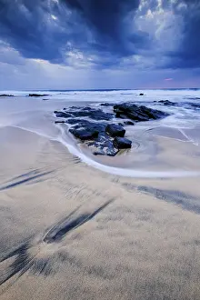 Time Exposure Images Prints: Beach with stones, waves and clouds