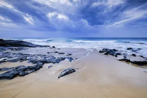 Long Exposure Water Photography Prints: Beach with stones, waves and clouds