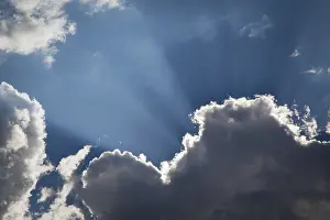 Cloudy Atmospheric Scene Prints: Beautiful dramatic storm clouds with silver lining and light rays with room for your own text or graphics