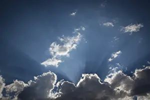 Cloudy Atmospheric Background Prints: Beautiful dramatic storm clouds with silver lining and light rays with room for your own text or graphics