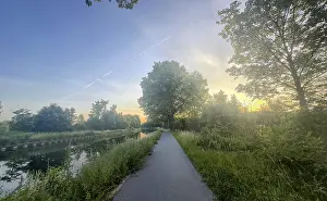 Lush Greenery Scenery Prints: A beautifully tranquil riverside path