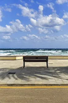 Spanish Coastal Scenery Prints: Empty bench with view of the surf