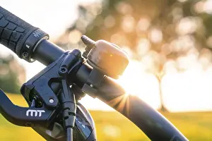 Southern Germany Cycling Prints: Bicycle handlebars with bell in the sunset