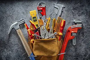 Black Background Photography Prints: Big Set Of Construction Tools In Leather Toolbelt