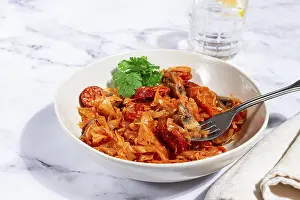 Traditional Polish Cuisine Prints: Bigos, Polish dish bigos, on a marble table
