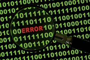 Data Security Breach Prints: Binary code with the word 'Error' viewed through a magnifying glass Binary code with the word