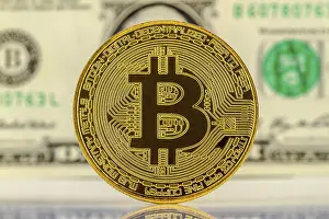 Cryptocurrency Symbol Prints: Bitcoin with dollar bill in the background