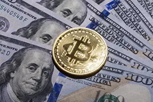 Bitcoin Close Up Prints: One Bitcoin on hundred dollars bills