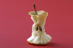 Plain Colored Background Images Prints: Bitten apple on red background