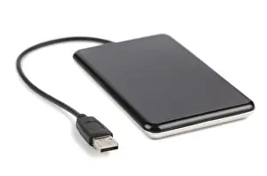 Bright Studio Photography Setup Prints: Black external hard disk with cable isolated on white background