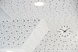Symbolic Time Concept Prints: Black and white clock on a black and white ceiling
