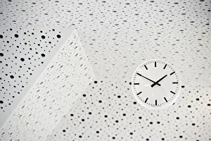 Symbolic Time Concept Prints: Black and white clock on a black and white ceiling
