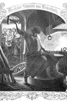 Blacksmith At Work Prints: A blacksmith at work with a big hammer