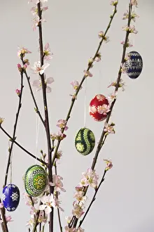 Central Europe Spring Scene Prints: Blooming branches of a peach tree in a vase decorated with Easter eggs