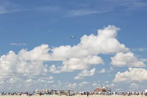 Cloudy Day At The Coast Prints: Blue sky with clouds over the beach
