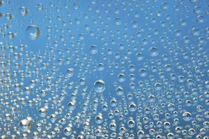 Deserted Seaside Landscape Prints: Blue water drops background