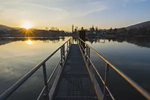 Evening Atmosphere In Bavaria Prints: Boat Dock on the River at Sunset