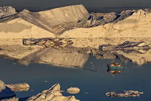 Ilulissat Icefjord Prints: Boat in front of icebergs, reflection