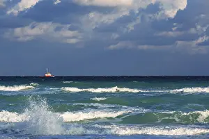 Gloomy Cloudy Sky Prints: Boat in the sea amid a thundercloud