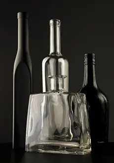 Empty Bottles Prints: Empty bottles on dark background