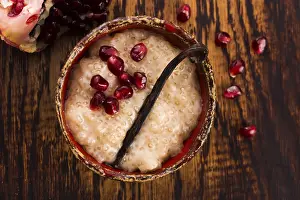 Exotic Fruit Desserts Prints: A bowl of tapioca pudding with vanilla and pomegranate