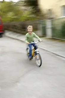 Young Cyclist Prints: Boy on Bicycle