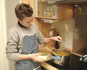 Kid In The Kitchen Prints: Boy cooks