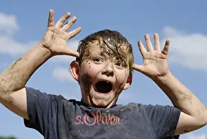 Joy Of Living Portrait Prints: Boy covered with mud
