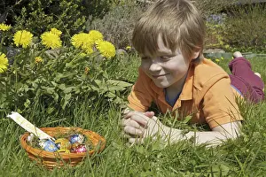 Easter Egg Hunt Prints: Boy found Easter eggs in Easter basket