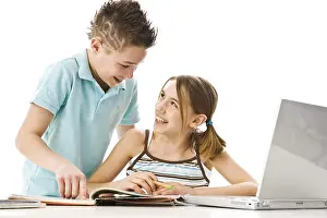 European Educational Institutions Prints: Boy and girl learning together with a computer