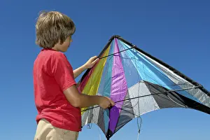 Fly A Kite Prints: Boy is going to launch his stunt kite