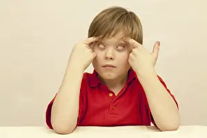 Caucasian Boy Portrait Prints: Boy making a face