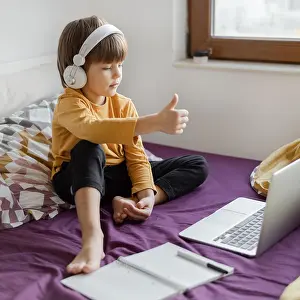 Thumbs Up Gesture Prints: Boy sitting bed learning thumbs up