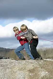 Tug Of War Prints: Two boys pulling on a rope, tug of war