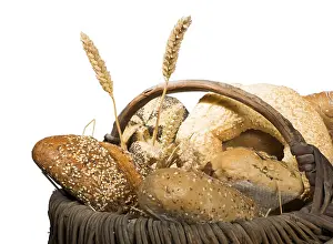 Freshly Baked Bread Prints: Bread in basket. White isolated