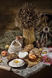 Whole Wheat Bread Prints: Bread, flowers, ild tableware on a canvas studio background
