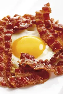 Pork Meat Products Prints: Breakfast bacon and a fried egg