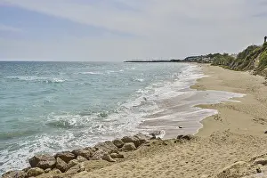 Spanish Coastline Prints: Breaking waves on a sandy beach